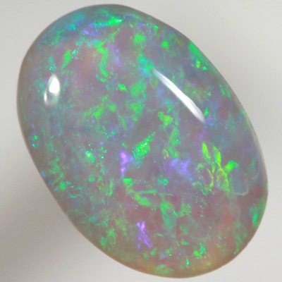 SOLID CRYSTAL OPAL Sparkling green in a 3D pattern, purple hue
